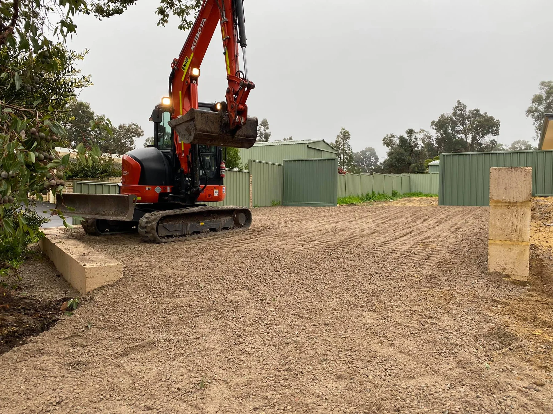 Driveway entrance clearing and earthworks with excavator in Perth WA